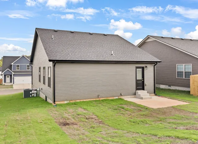 a house view with a garden space