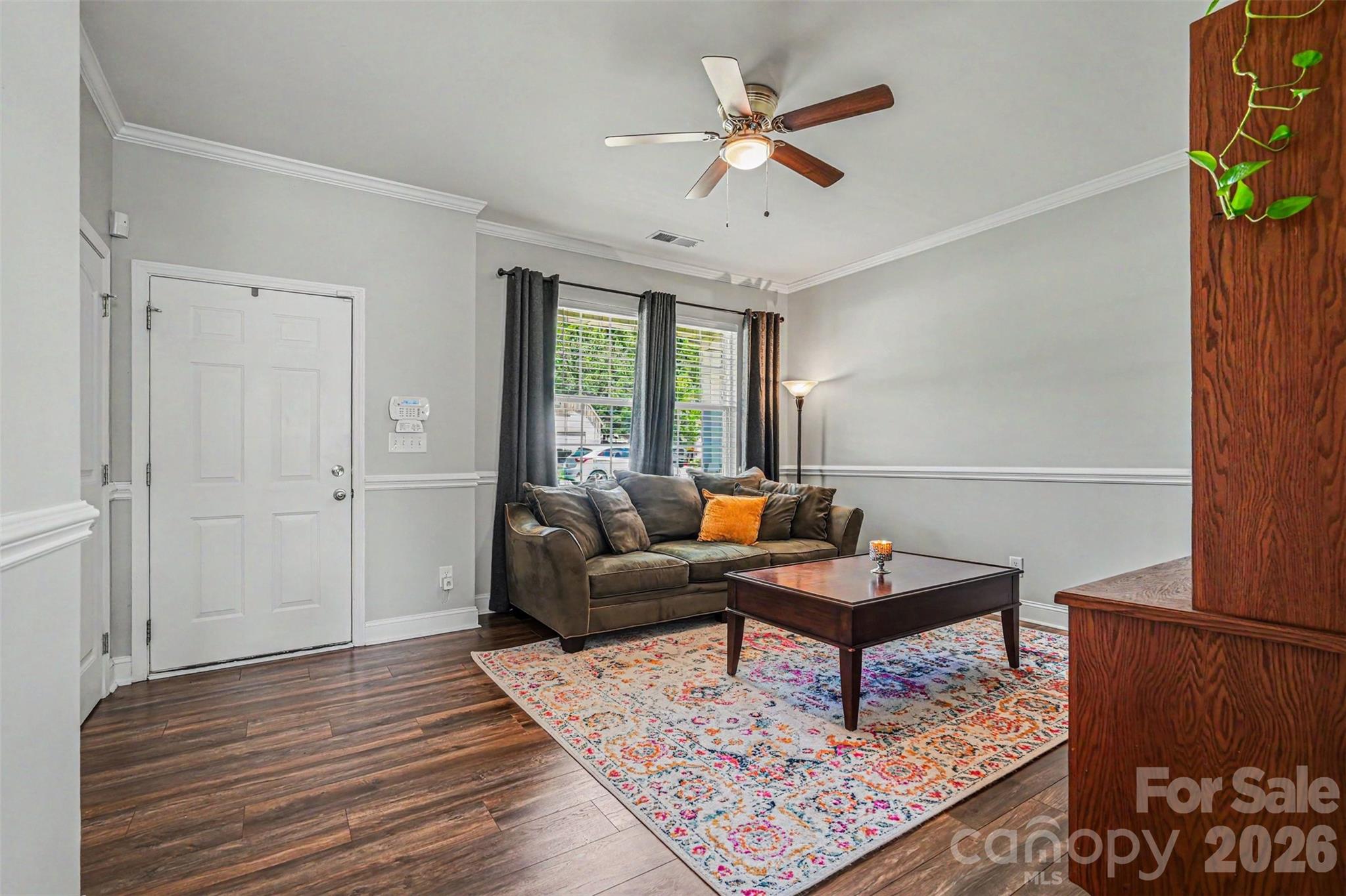 1610 Walter Hasty Road Monroe, NC 28110 - Photo 22 of 32 a living room with furniture and wooden floor