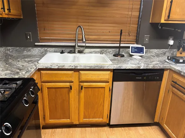 a bathroom with sink and mirror