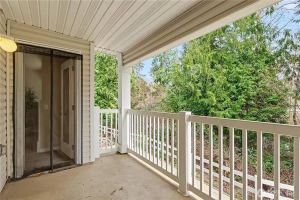 a view of wooden balcony with outdoor space