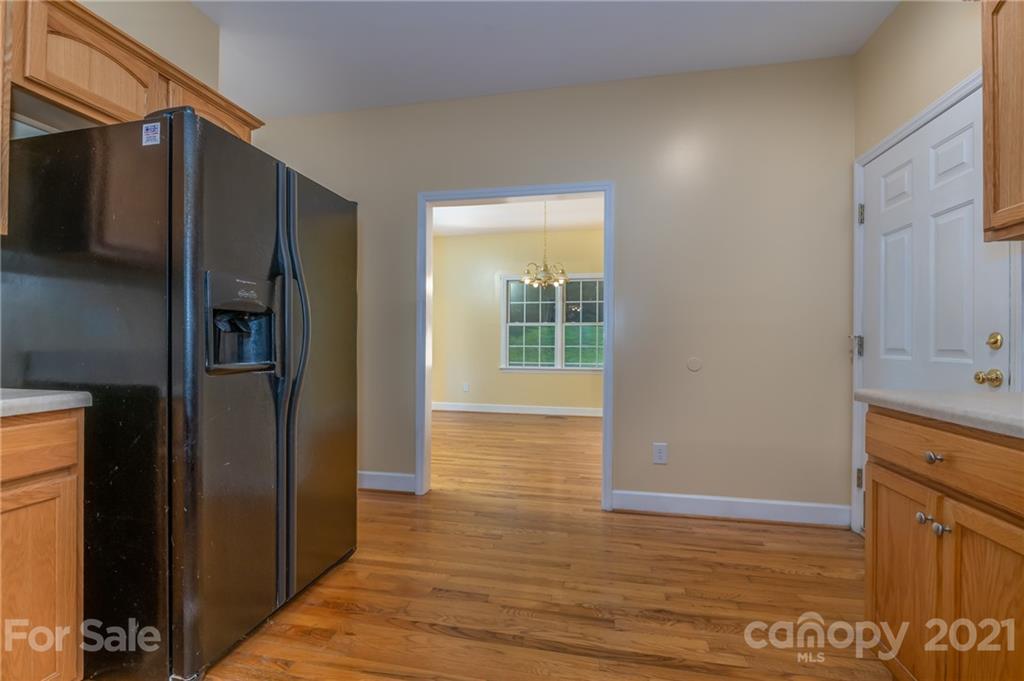 185 Sherry Street Rutherfordton, NC 28139 - Photo 14 of 36 a view of a kitchen from the hallway