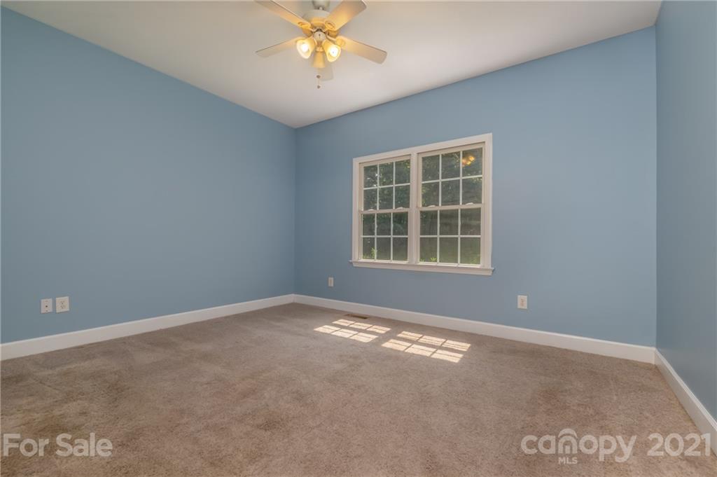 185 Sherry Street Rutherfordton, NC 28139 - Photo 22 of 36 a view of an empty room with a window