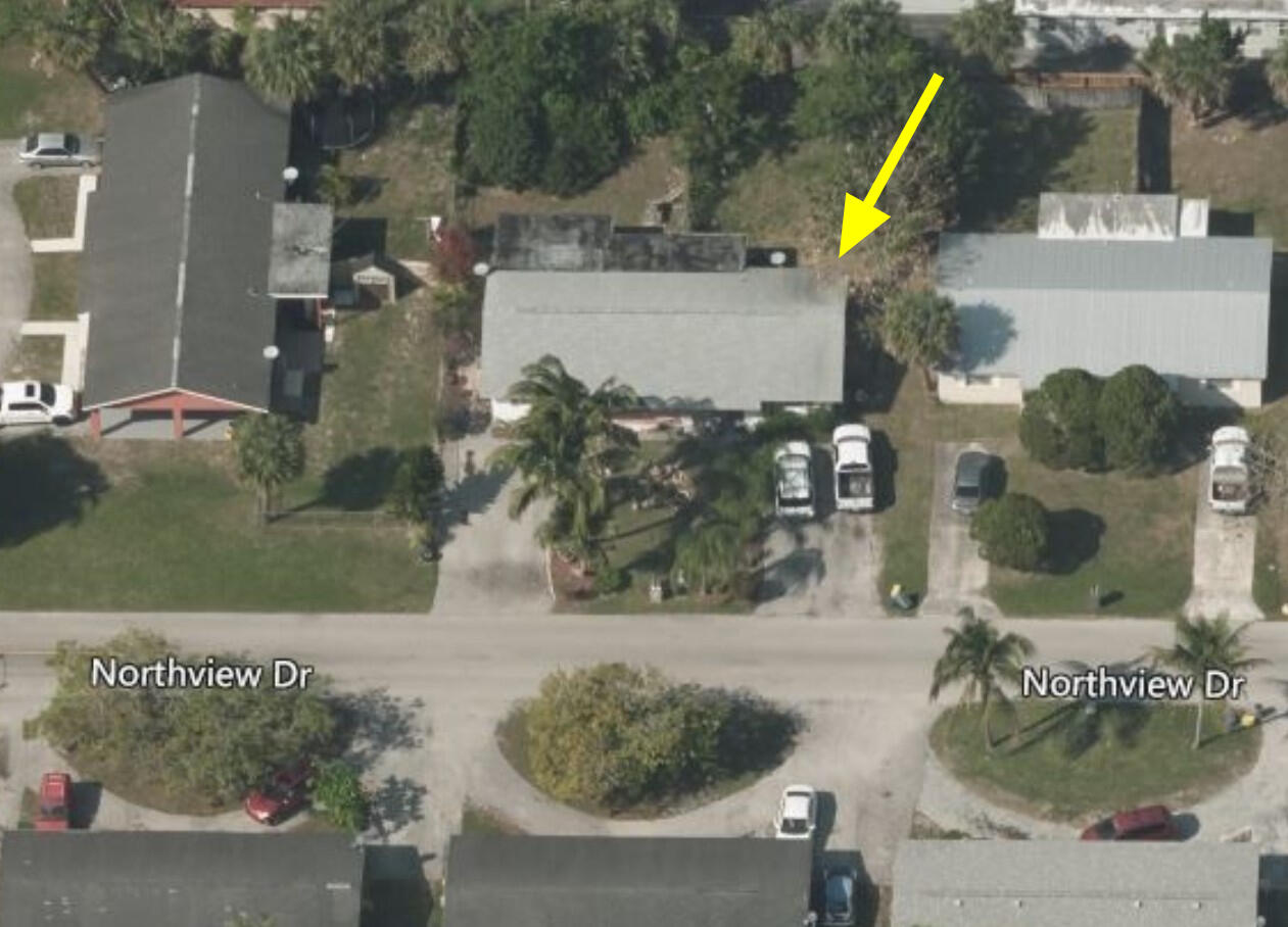 725 Northview Drive Jupiter, FL 33458 - Photo 4 of 8 an aerial view of a house