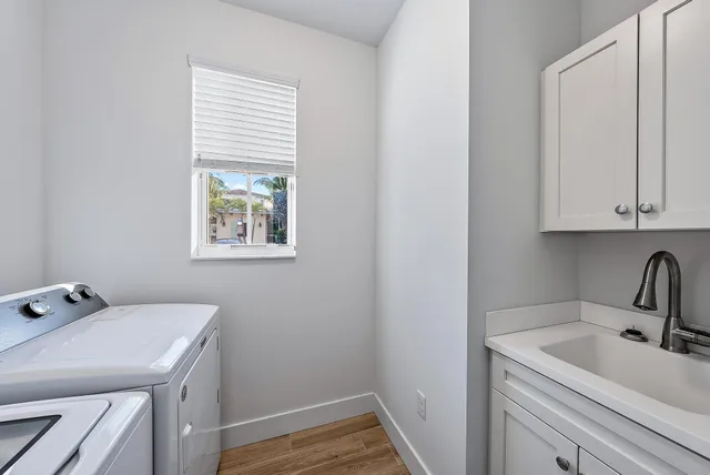 a bathroom with a sink and a window