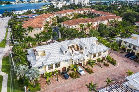 an aerial view of residential houses and outdoor space