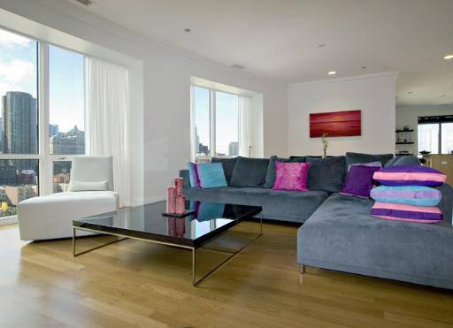60 West Erie Street, Unit 1102 Chicago, IL 60654 - Photo 2 of 12 a living room with furniture and a window