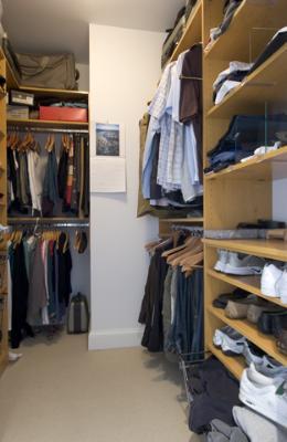 60 West Erie Street, Unit 1102 Chicago, IL 60654 - Photo 10 of 12 a view of walk in closet with clothes and shoes