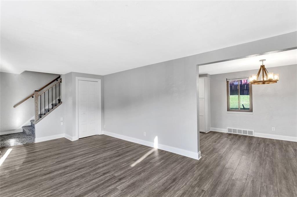 225 Houston Road Pittsburgh, PA 15237 - Photo 12 of 25 a view of empty room with wooden floor and fan