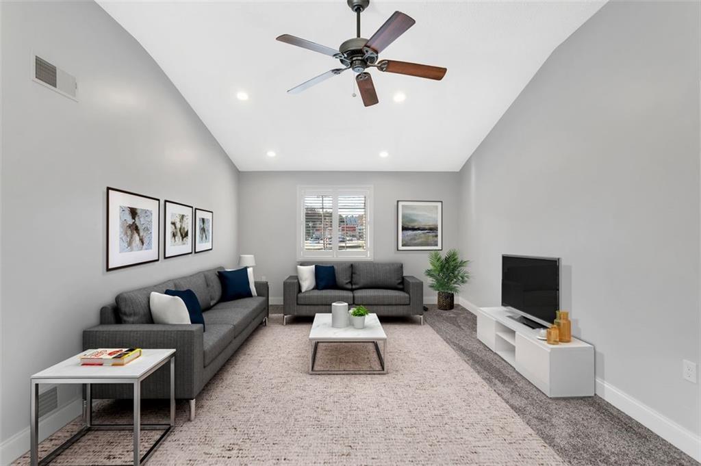225 Houston Road Pittsburgh, PA 15237 - Photo 18 of 25 a living room with furniture and a flat screen tv