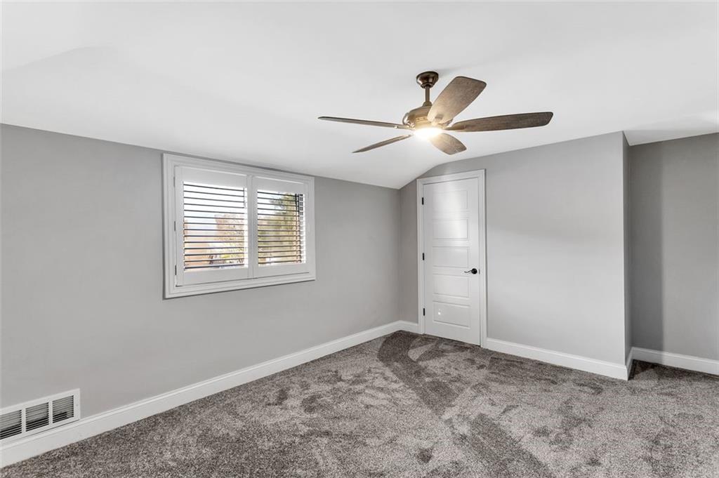 225 Houston Road Pittsburgh, PA 15237 - Photo 21 of 25 a view of a livingroom with a ceiling fan and window