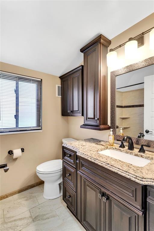 225 Houston Road Pittsburgh, PA 15237 - Photo 22 of 25 a bathroom with a granite countertop sink toilet and mirror