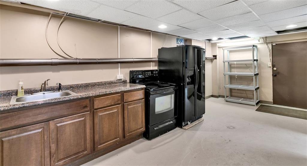 225 Houston Road Pittsburgh, PA 15237 - Photo 25 of 25 a kitchen with stainless steel appliances granite countertop a refrigerator sink and stove