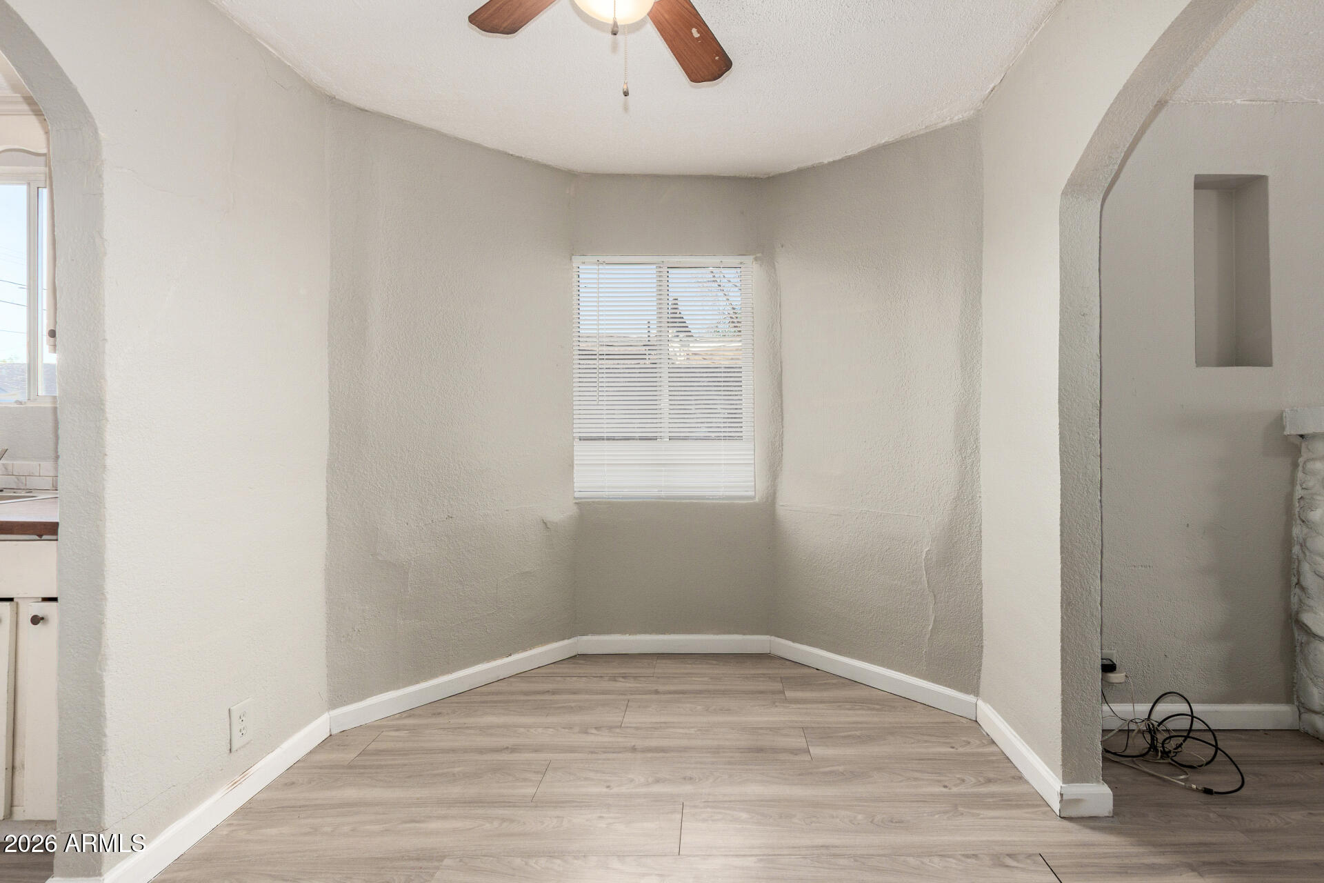 2135 West Hadley Street, Unit 1 Phoenix, AZ 85009 - Photo 9 of 18 a view of empty room with wooden floor