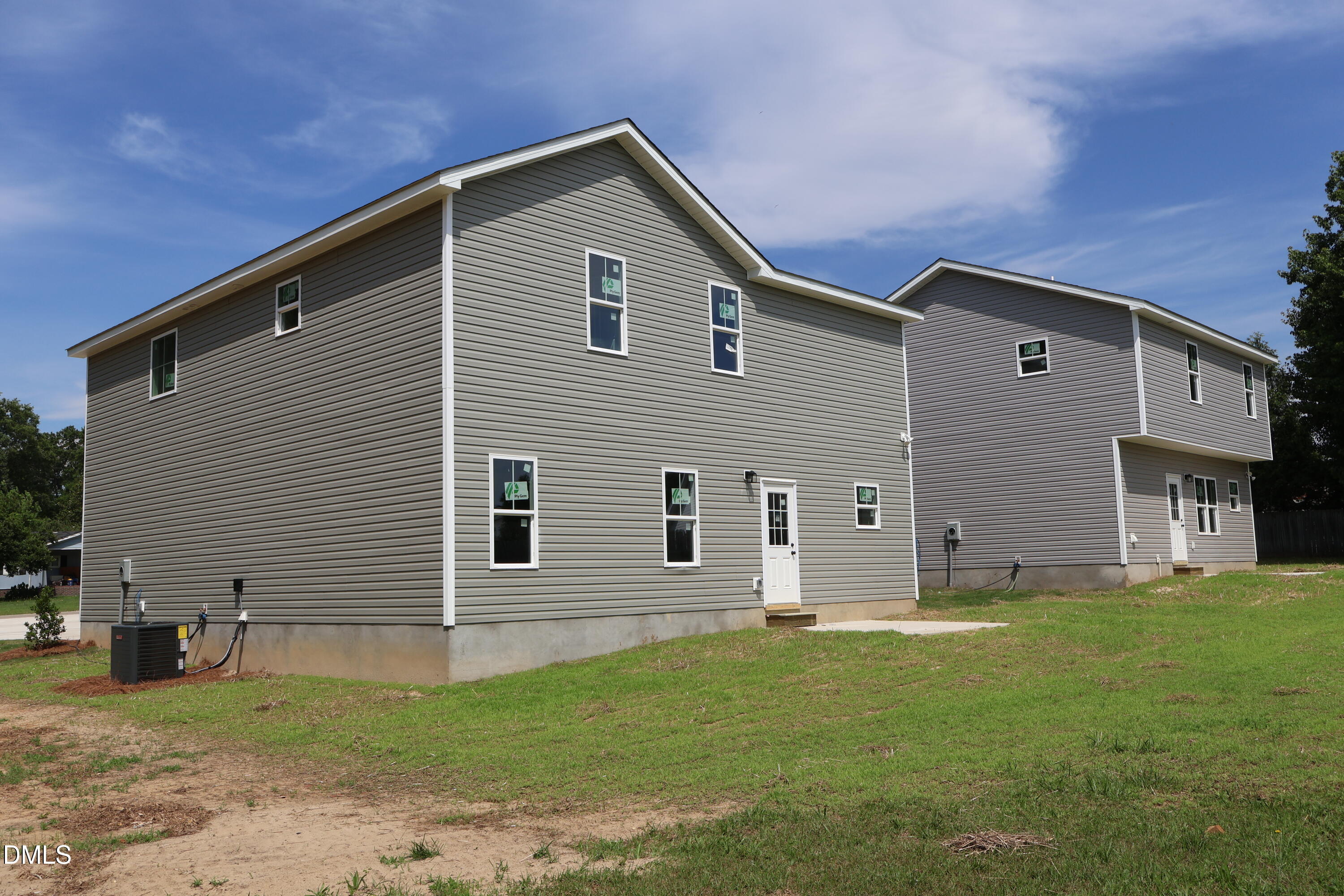 125 Wilson Street Erwin, NC 28339 - Photo 4 of 22 a front view of a house with a yard