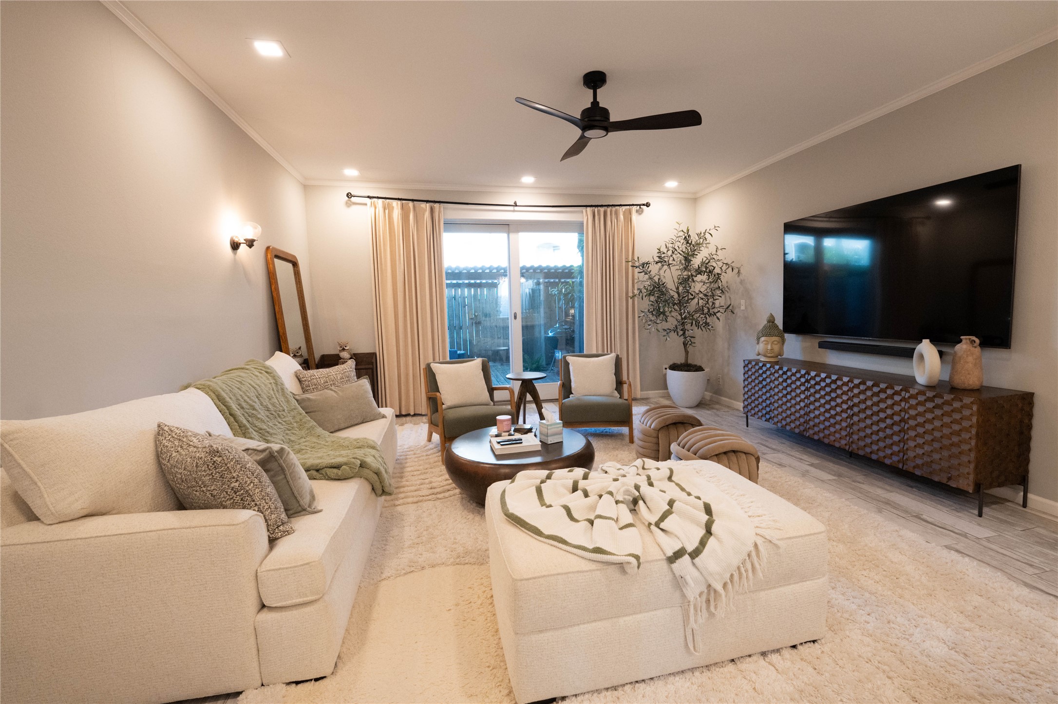 7447 Brompton Street, Unit 7447 Houston, TX 77025 - Photo 7 of 27 Another View of the Living room view.