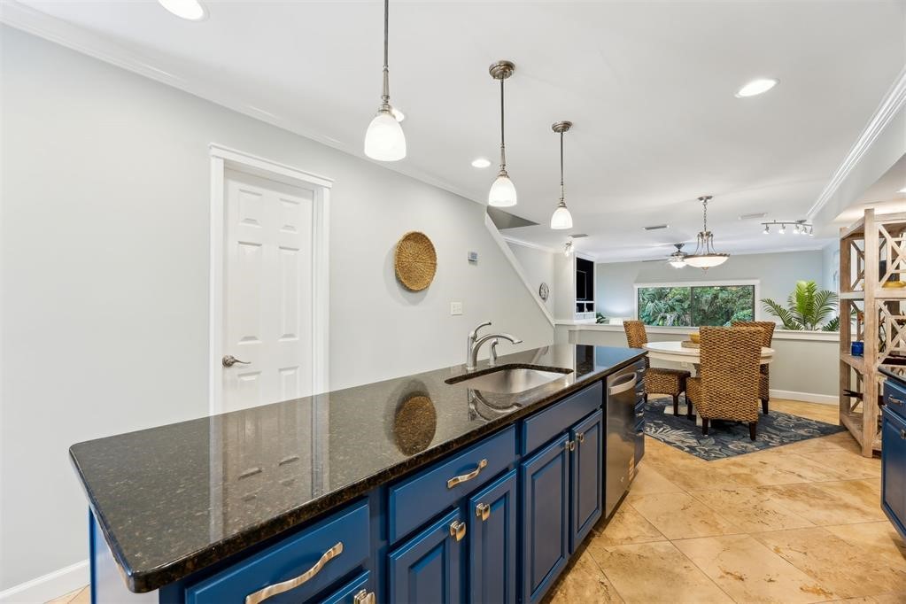 3033 Sea Marsh Road Fernandina Beach, FL 32034 - Photo 12 of 37 a kitchen with a sink and a stove