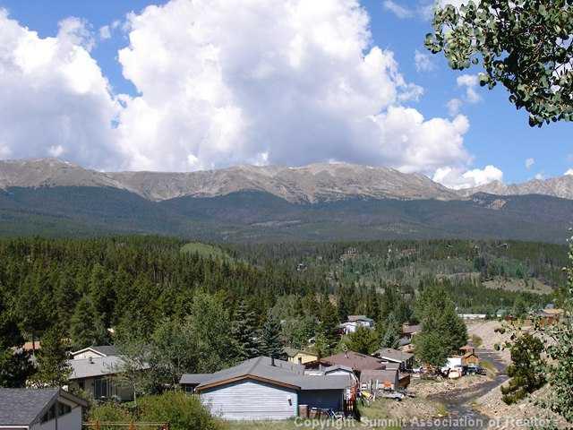 63 Reiling Road Breckenridge, CO 80424 - Photo 2 of 7 a view of a town with mountains in the background