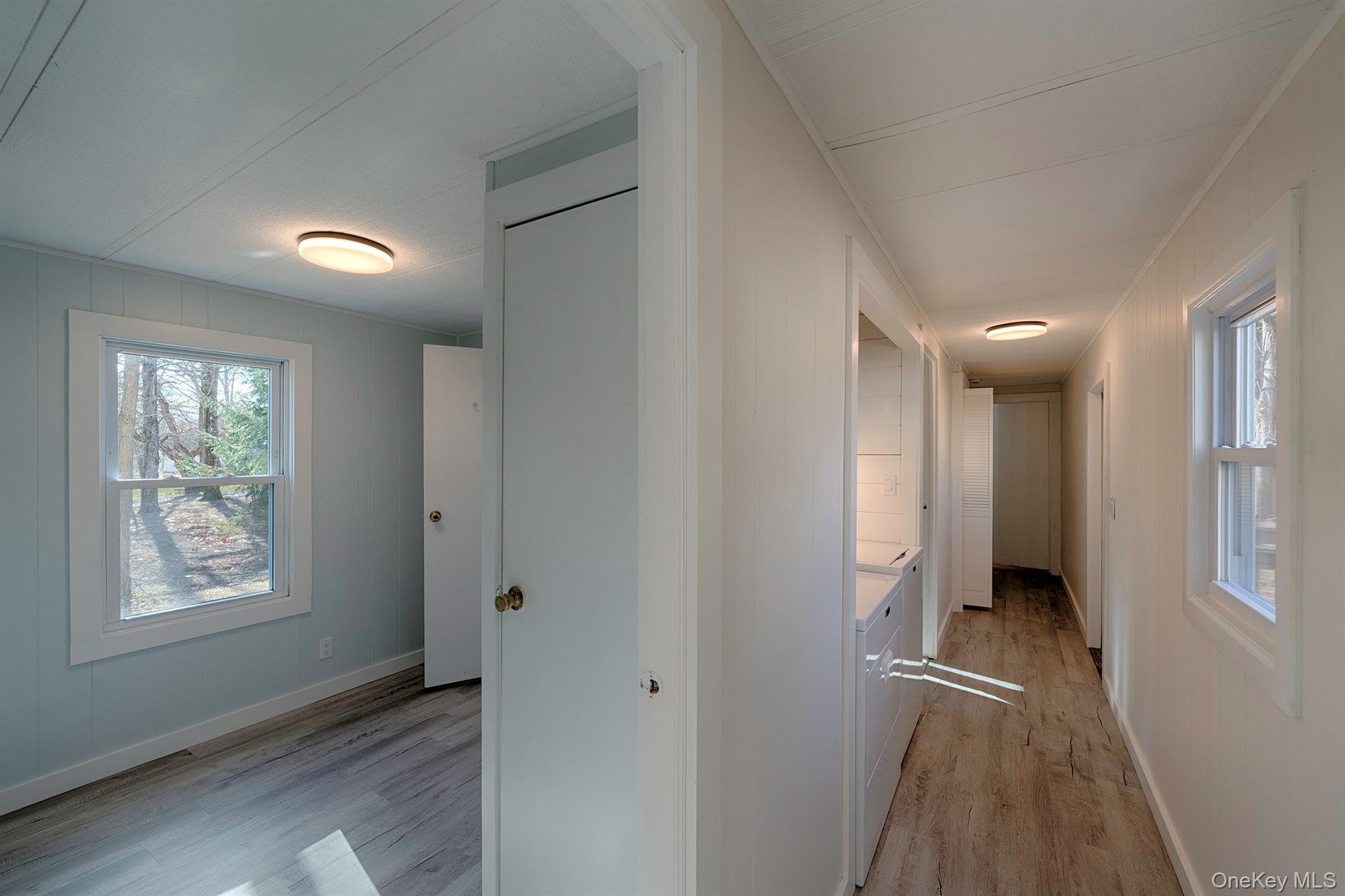 193 Decker Road Stanfordville, NY 12581 - Photo 12 of 34 a view of hallway with stairs and a window