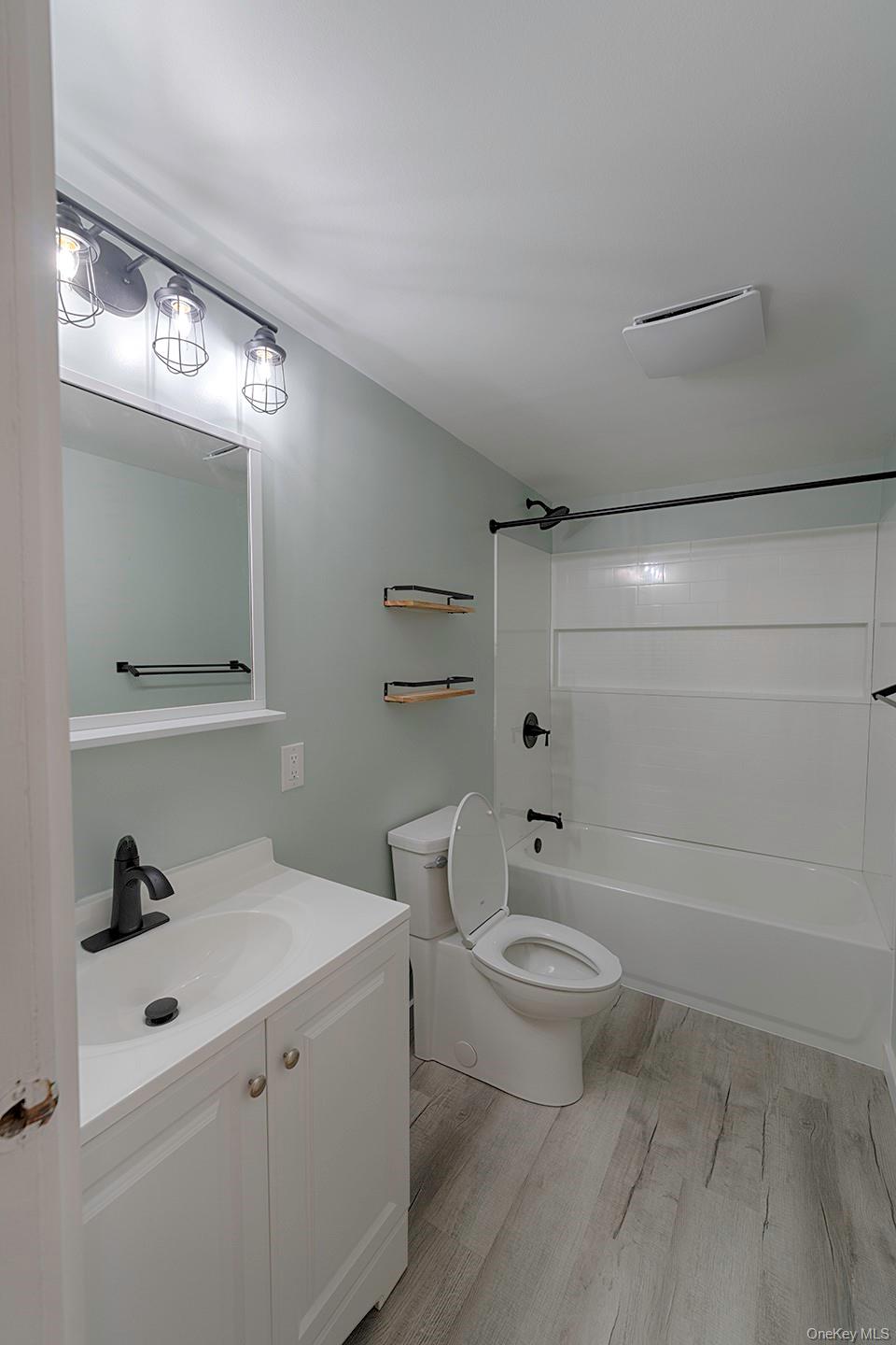 193 Decker Road Stanfordville, NY 12581 - Photo 16 of 34 a bathroom with a toilet a sink and mirror