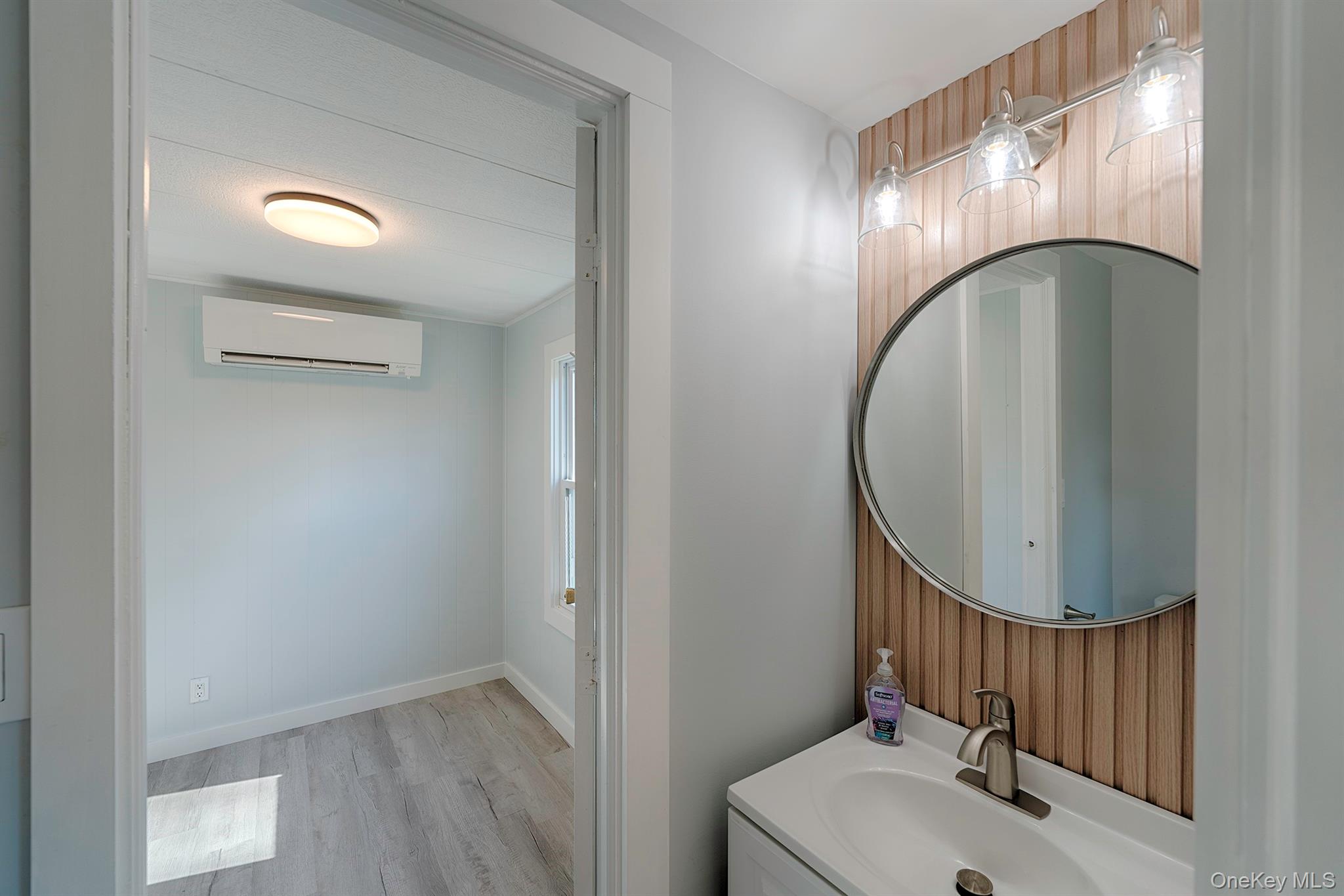 193 Decker Road Stanfordville, NY 12581 - Photo 22 of 34 a bathroom with a sink and a mirror