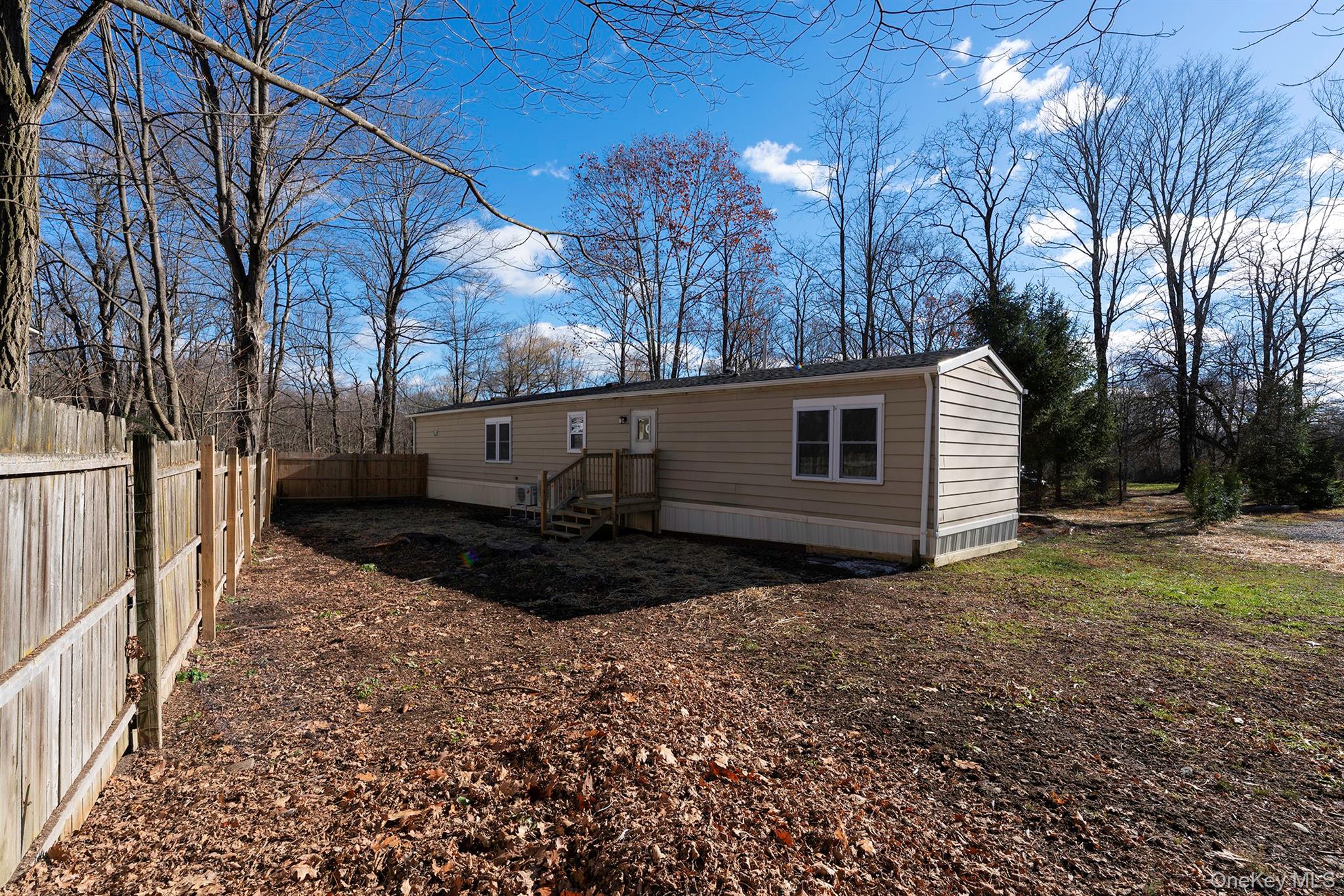 193 Decker Road Stanfordville, NY 12581 - Photo 27 of 34 a view of a house with backyard and trees