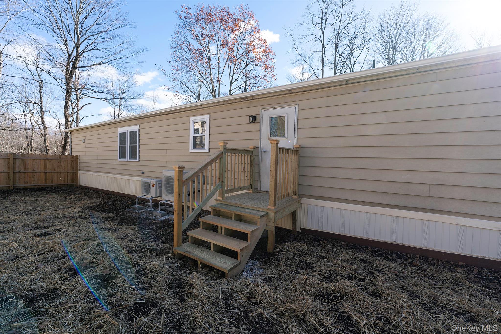193 Decker Road Stanfordville, NY 12581 - Photo 29 of 34 a view of a house with a yard and wooden fence