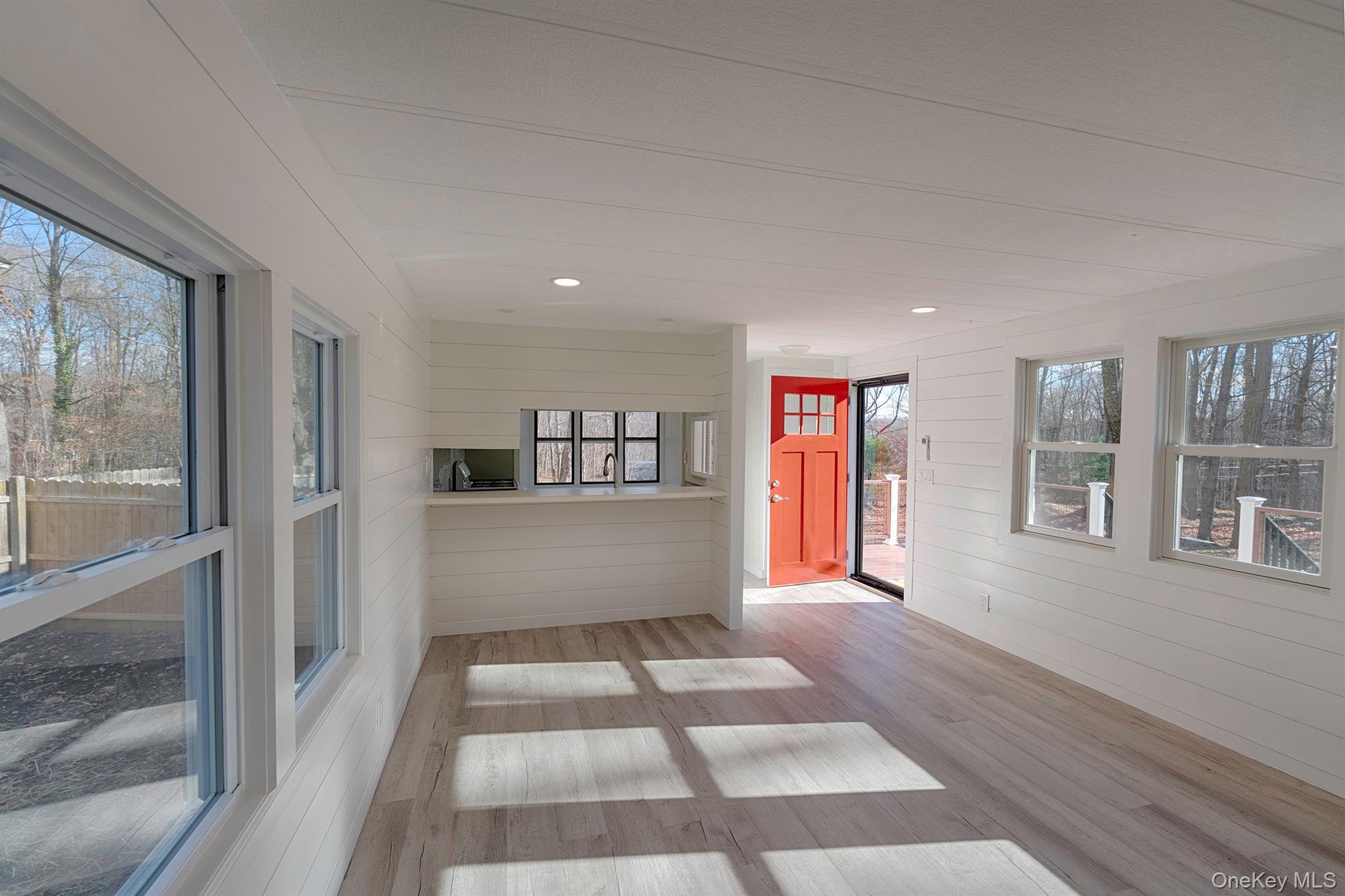 193 Decker Road Stanfordville, NY 12581 - Photo 4 of 34 a view of an empty room with wooden floor and a window