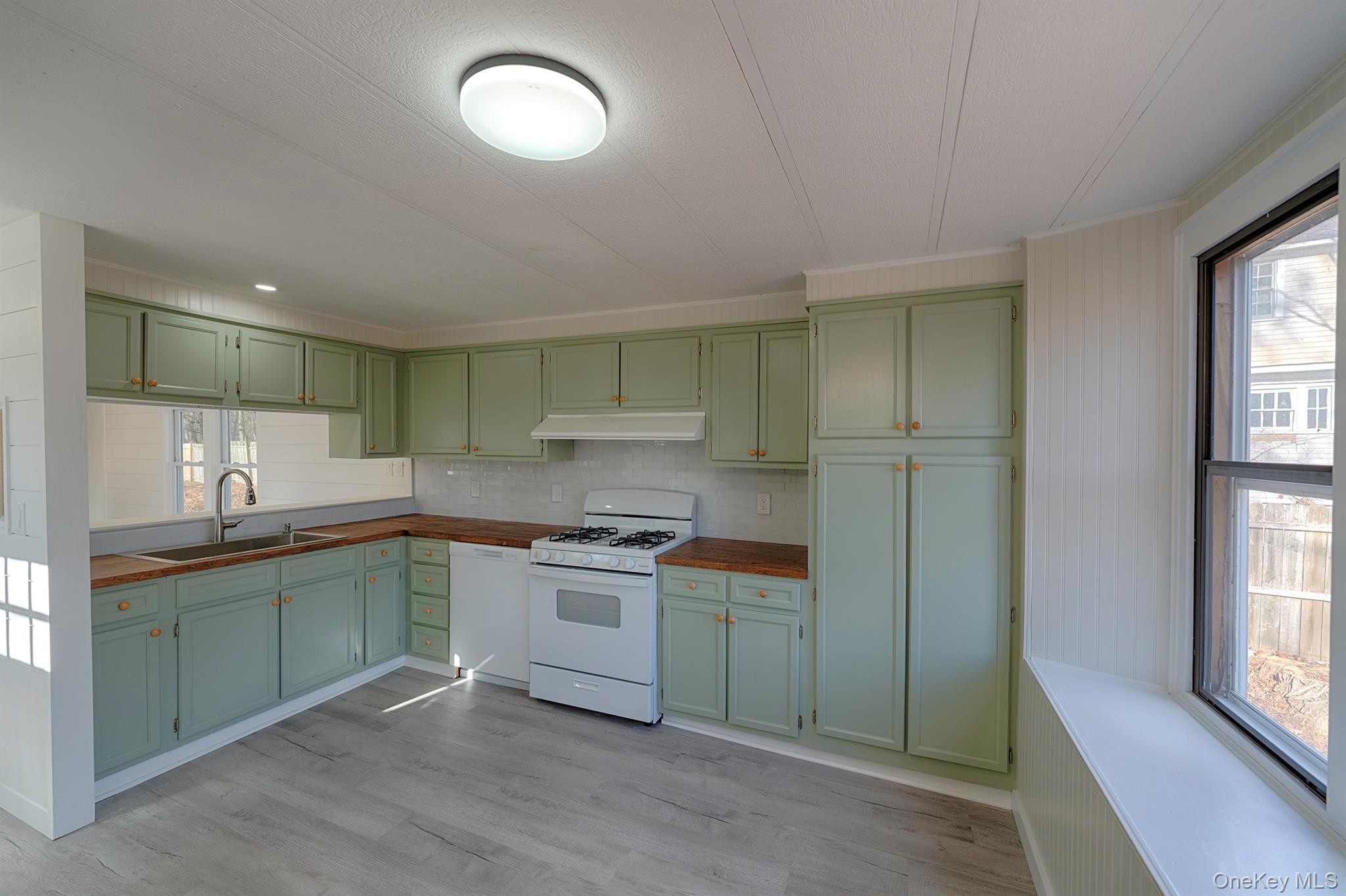 193 Decker Road Stanfordville, NY 12581 - Photo 9 of 34 a kitchen with a sink and cabinets
