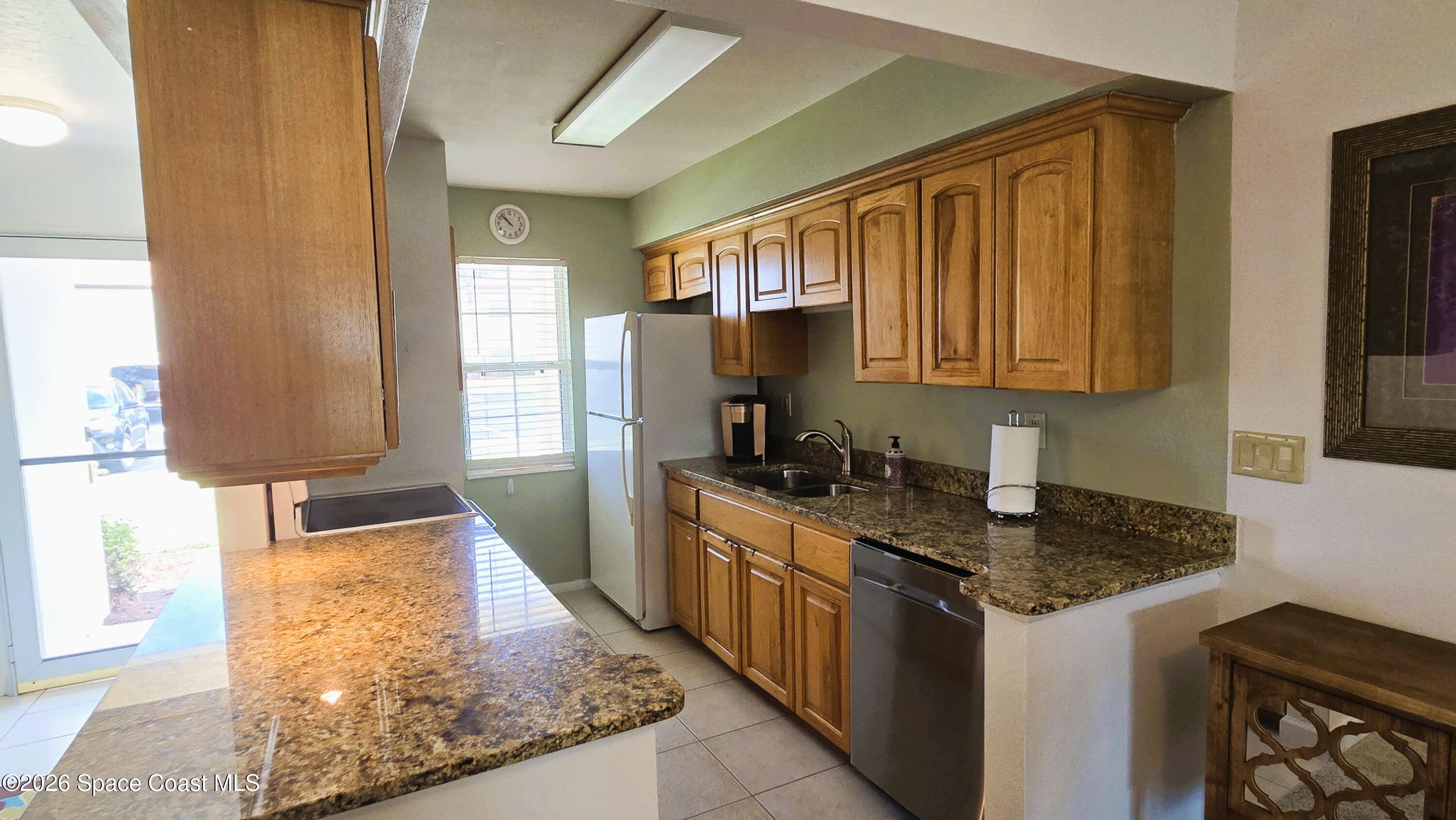 412 School Road, Unit 88 Indian Harbour Beach, FL 32937 - Photo 13 of 50 Granite kitchen