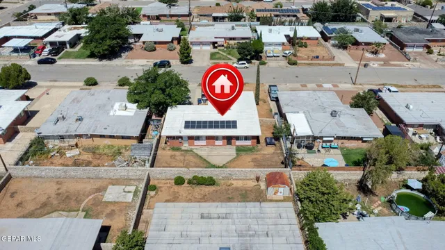 an aerial view of residential house with outdoor space