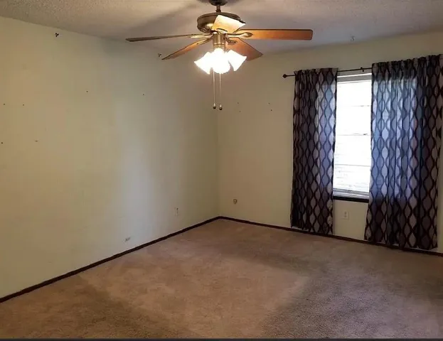 a view of a window in an empty room