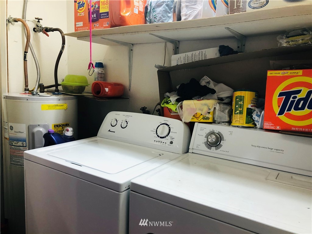 1421 North 3rd Street Renton, WA 98057 - Photo 17 of 17 a utility room with dryer and washer