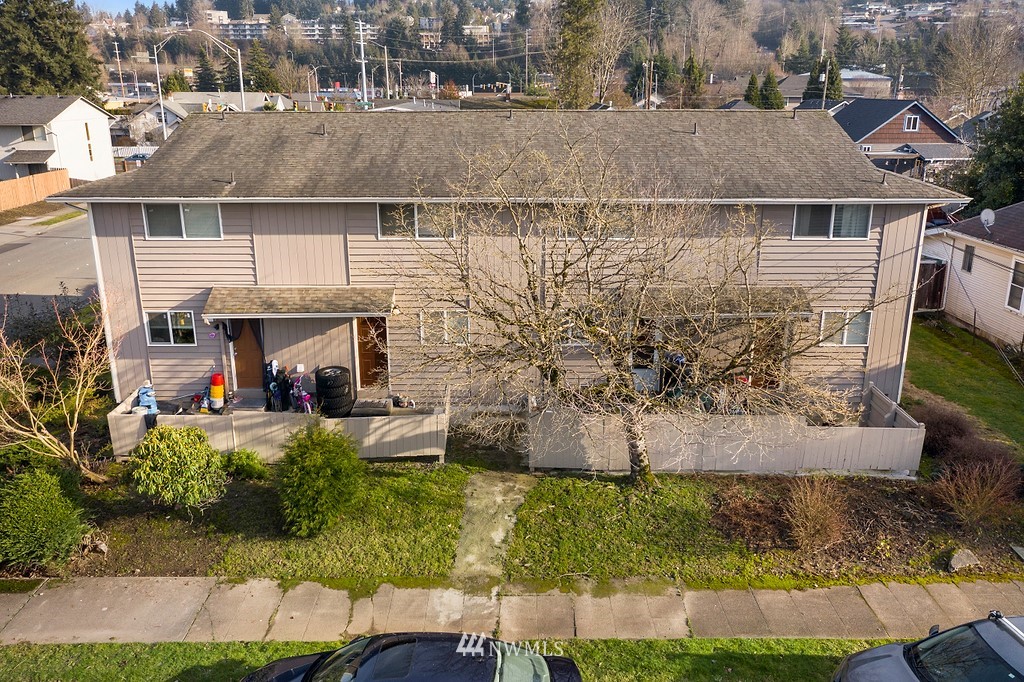 1421 North 3rd Street Renton, WA 98057 - Photo 7 of 17 a aerial view of a house with a yard and large tree