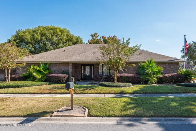 a front view of a house with swimming pool