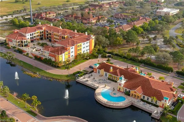 an aerial view of a house with outdoor space