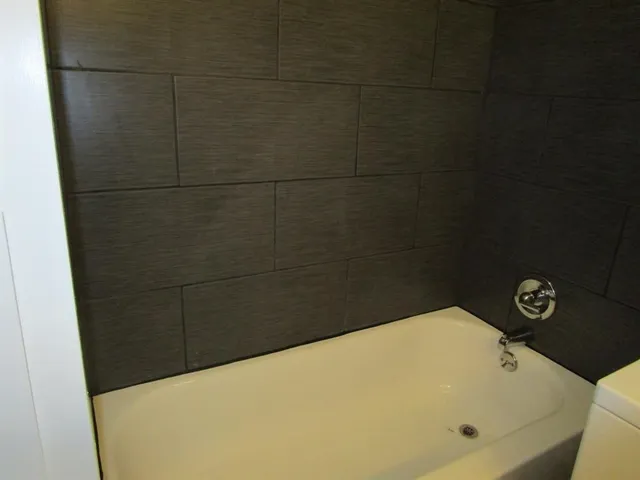 a bathroom with a bathtub