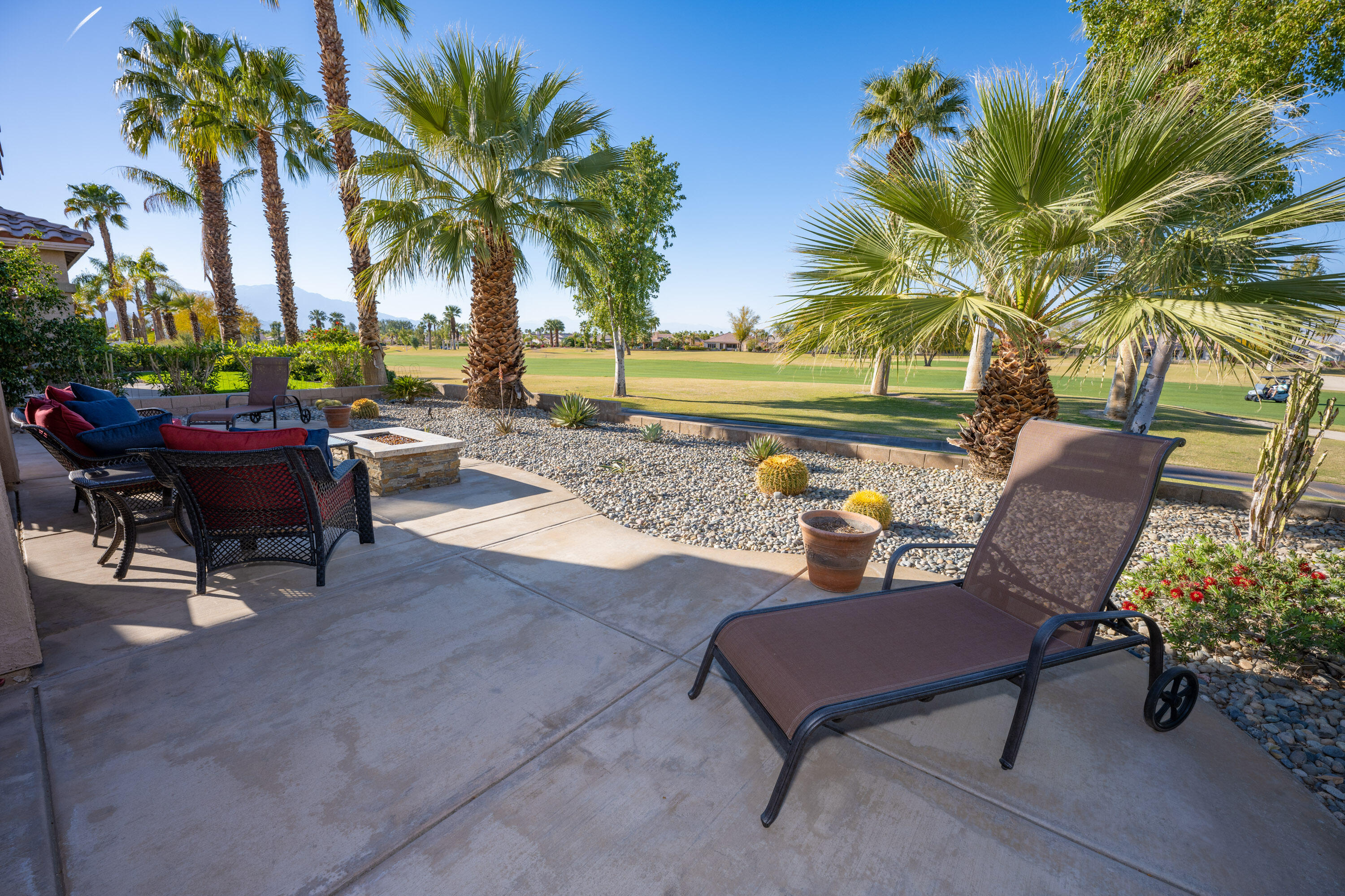 79754 Carmel Valley Avenue Indio, CA 92201 - Photo 21 of 36 a view of a backyard with sitting area