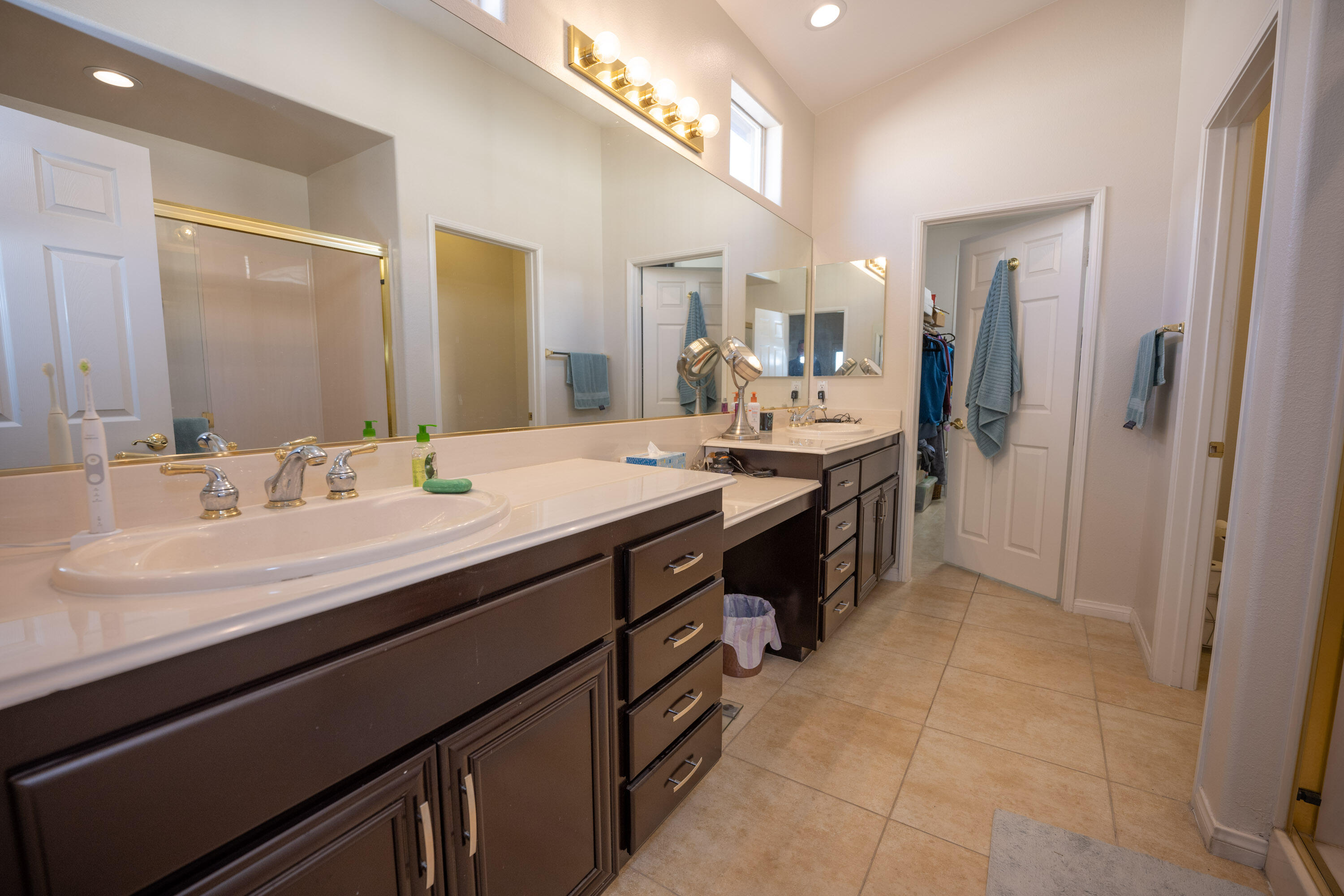 79754 Carmel Valley Avenue Indio, CA 92201 - Photo 8 of 36 a bathroom with a sink double vanity and a mirror