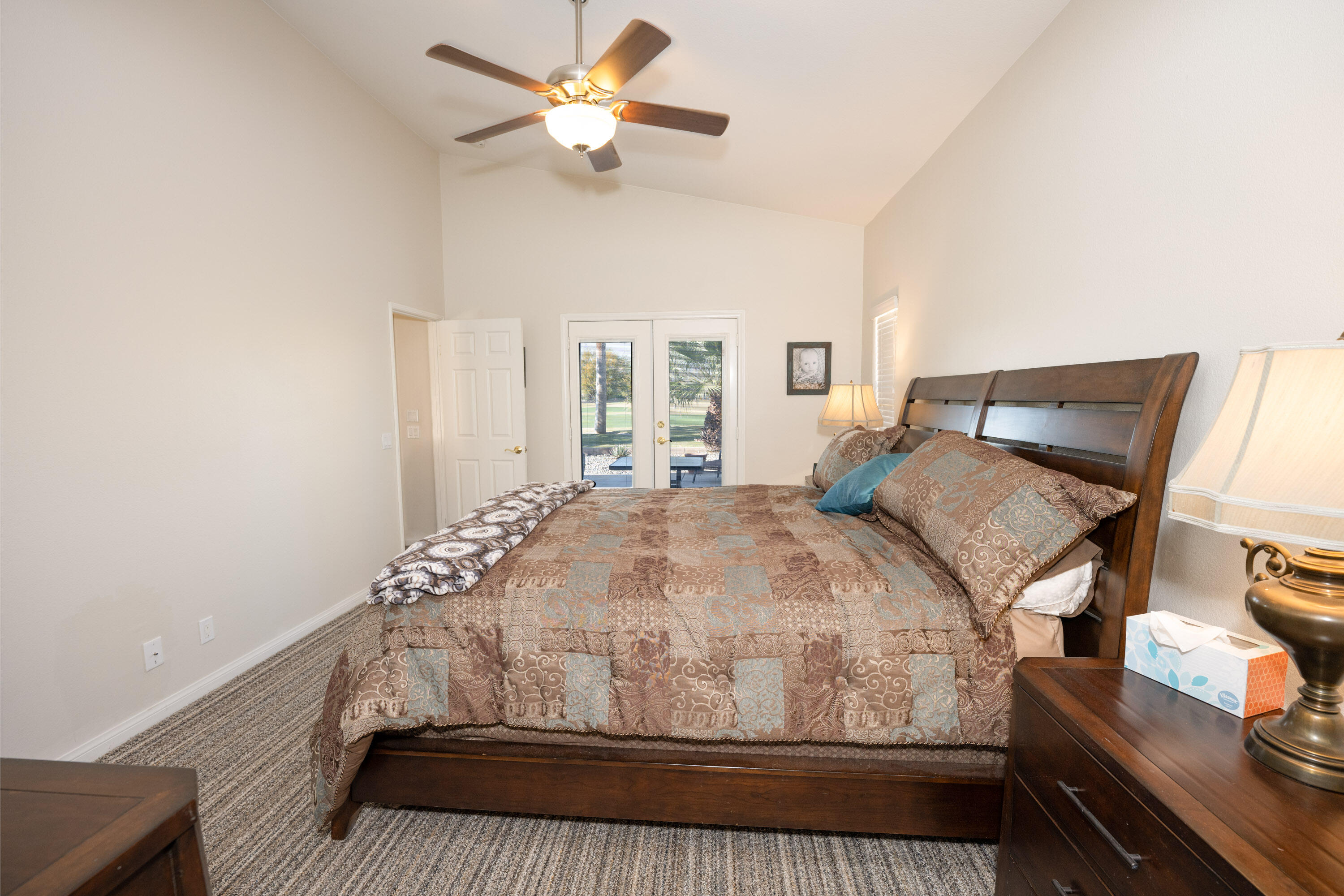 79754 Carmel Valley Avenue Indio, CA 92201 - Photo 9 of 36 a bedroom with a bed and a window