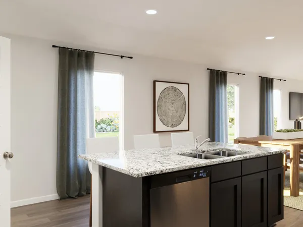 a bedroom with a bed and a large mirror