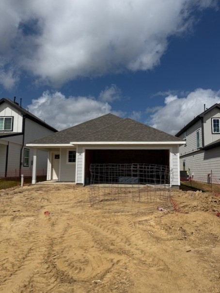 13634 Kit Run Splendora, TX 77372 - Photo 2 of 36 a view of a house with a yard