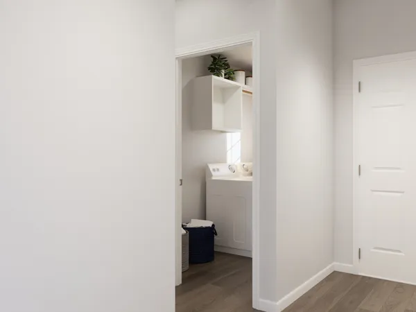a bathroom with a granite countertop sink toilet and mirror