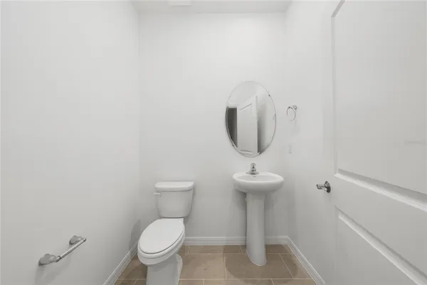 a bathroom with a toilet and a sink