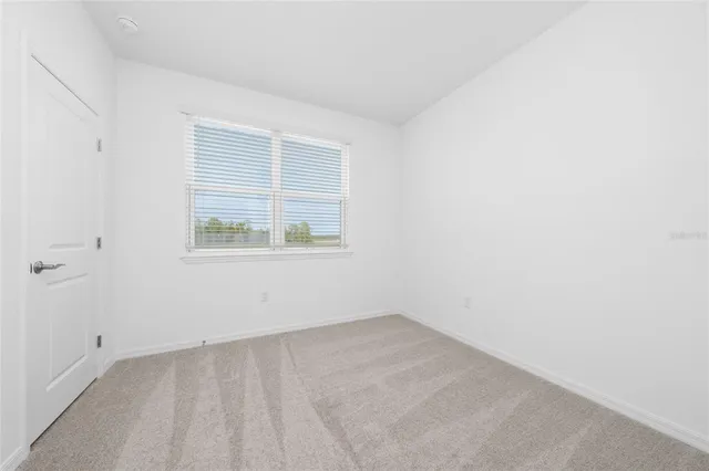 an empty room with a window