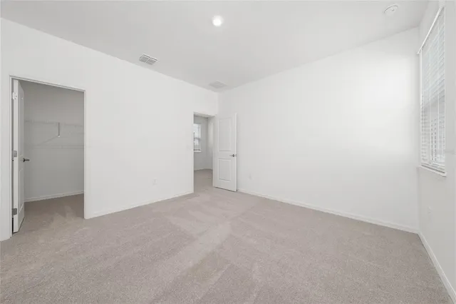 an empty room with an entryway