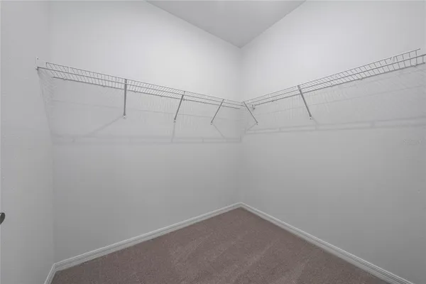 a empty closet with white paint