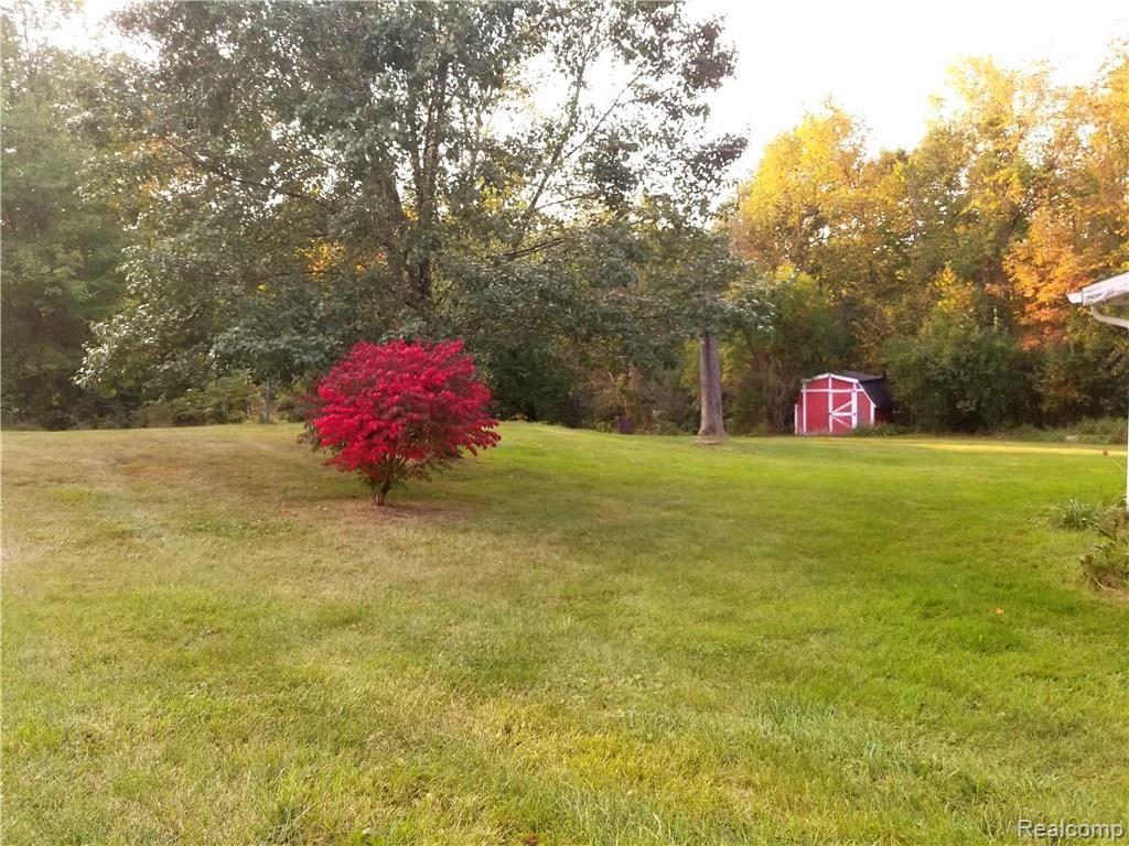 14384 Hess Road Holly, MI 48442 - Photo 26 of 30 Backyard in fall