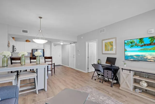 a view of swimming pool from a lake view