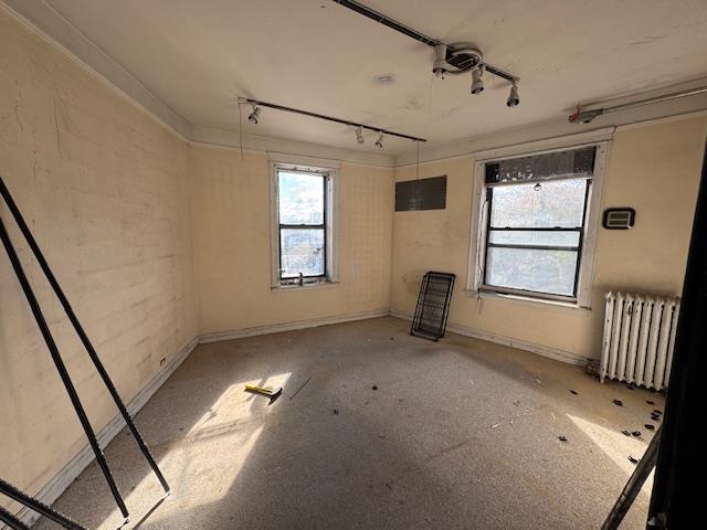 1825 Riverside Drive, Unit 5B Manhattan, NY 10034 - Photo 15 of 19 a view of empty room with windows