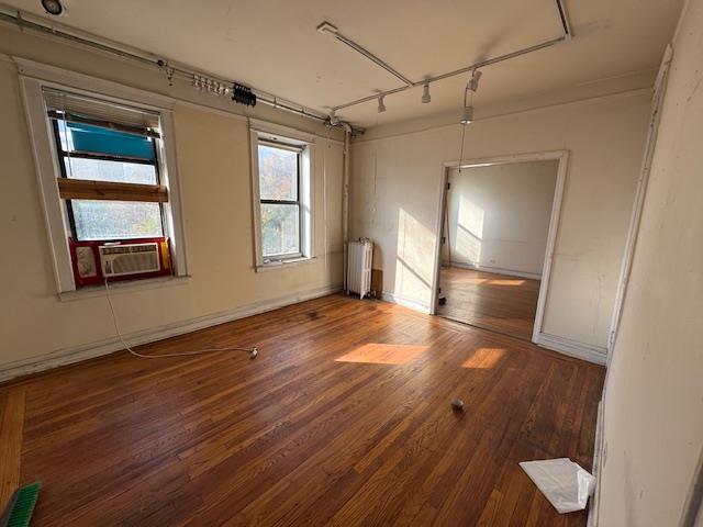 1825 Riverside Drive, Unit 5B Manhattan, NY 10034 - Photo 16 of 19 a view of empty room with wooden floor and fan